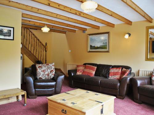 A seating area at Riverside Cottage 