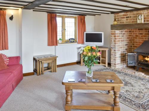 A seating area at Old Post Office Cottage 