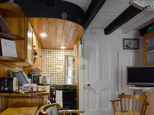 A television and/or entertainment center at St Robert'S Chantry 