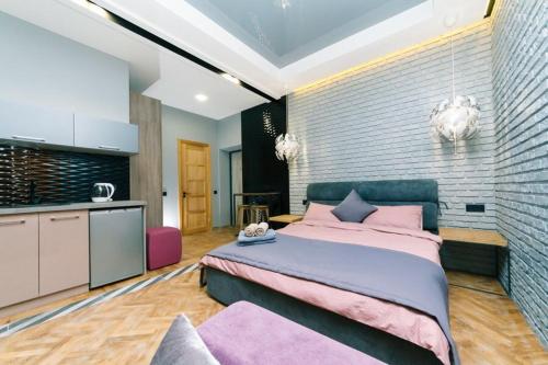 Кровать или кровати в номере Tomas apartments