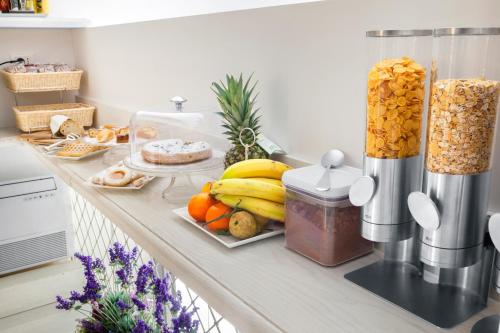 a kitchen counter with fruits and nuts on it at La Piazzetta Guest House in Sorrento