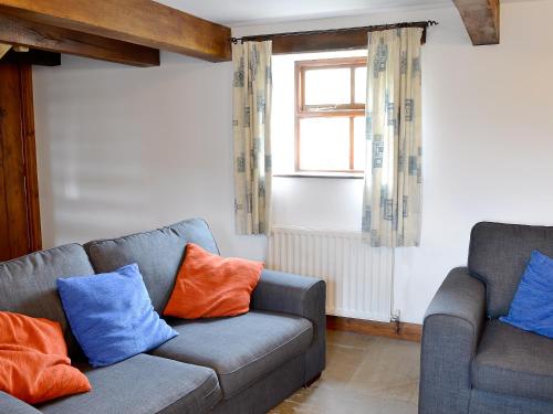 A seating area at 1 Covil Barn Cottage 