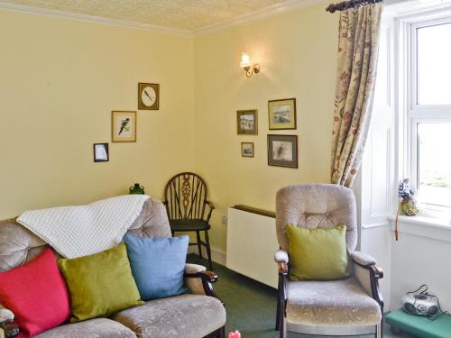 A seating area at Beach Cottage 