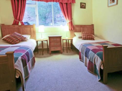 A bed or beds in a room at Mountain View 