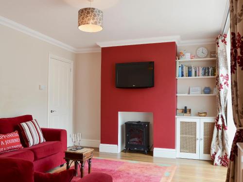 A television and/or entertainment center at Kew Lodge 