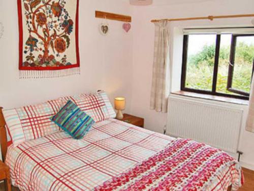 A bed or beds in a room at Penrose 