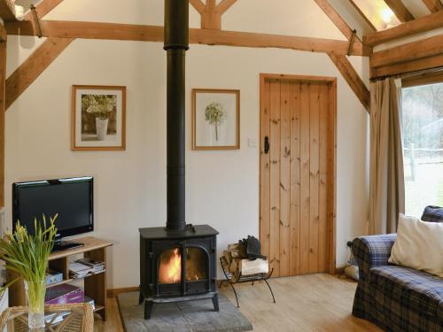 A television and/or entertainment center at Rushfields Barn 