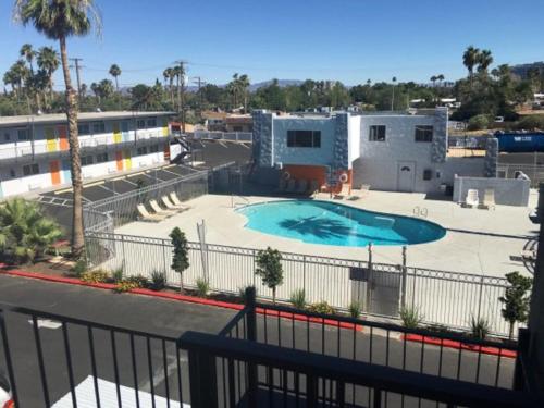 a view of a swimming pool from a building at Super 8 by Wyndham Las Vegas North Strip/Fremont St. Area in Las Vegas