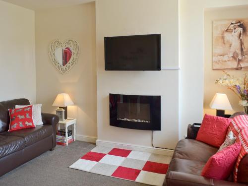 A television and/or entertainment center at Weets Cottage 