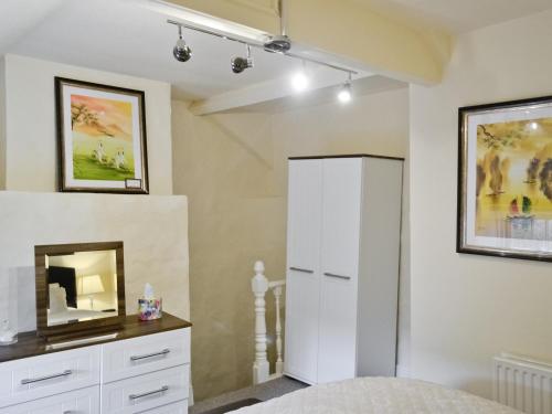 A bathroom at Blossom Cottage 