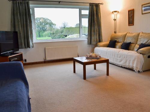 A seating area at Little Marshfoot Bungalow 