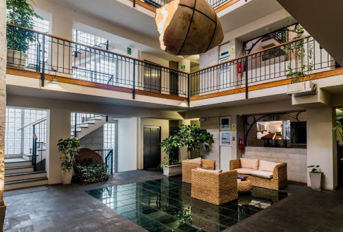 a lobby with a basketball hanging from the ceiling at Palla Boutique Hotel in Arequipa