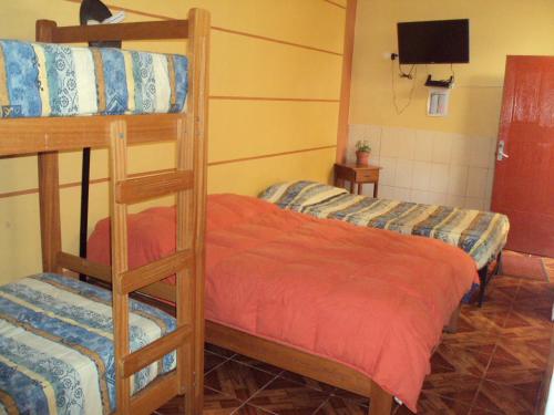 Postel nebo postele na pokoji v ubytování Hospedaje Del Pilar en Magdalena del Mar