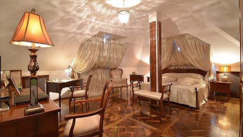 Postel nebo postele na pokoji v ubytování Scala Boutique-Hotel