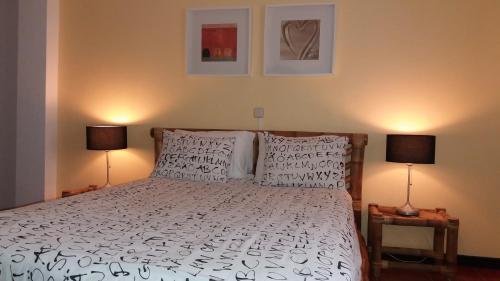 Postel nebo postele na pokoji v ubytování Travelers by Rio NaturAL