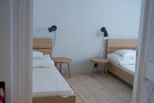 מיטה או מיטות בחדר ב-Apartament Ludowa 1 Międzyzdroje