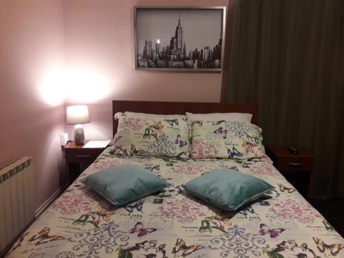 מיטה או מיטות בחדר ב-Hostal Torres del Paine 2