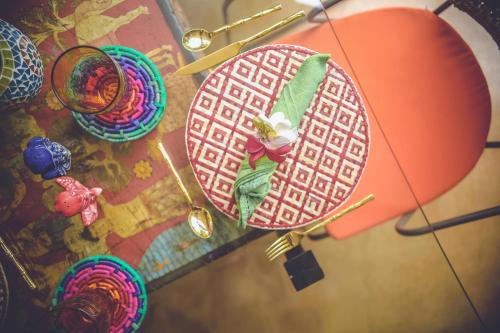 an overhead view of a doll sitting in an umbrella at Aathma Colombo House in Colombo