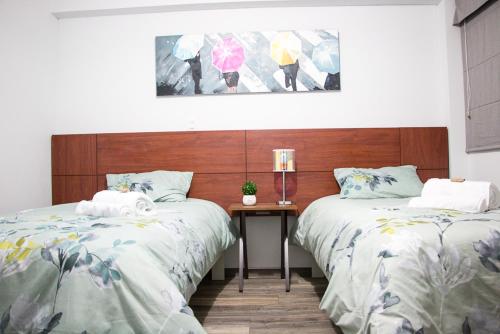 Gulta vai gultas numurā naktsmītnē Cuzco Apartment