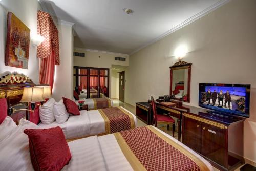Cama o camas de una habitación en Comfort Inn Hotel Deira
