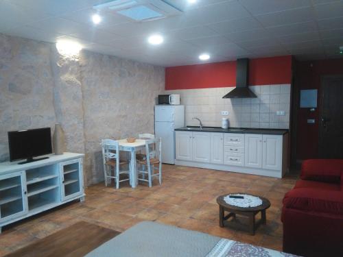 Kuchyň nebo kuchyňský kout v ubytování Apartamentos Calanda