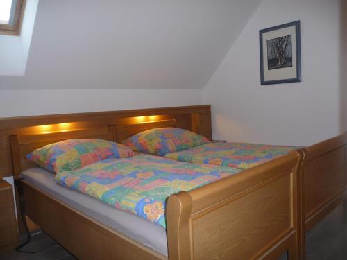 Кровать или кровати в номере NR- Fewo mit Ladestation für E-Autos