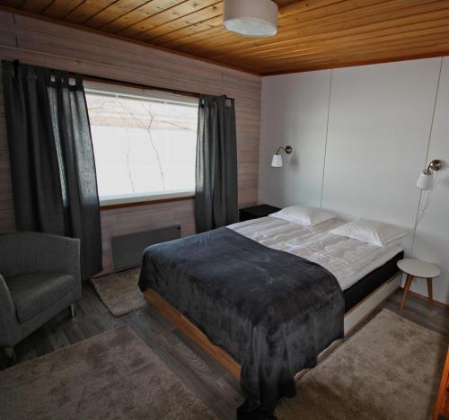 מיטה או מיטות בחדר ב-Villa Kinos