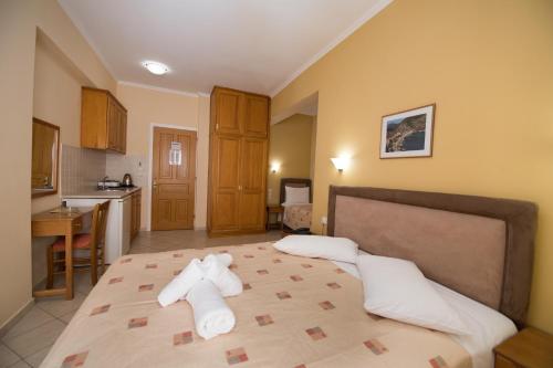 Кровать или кровати в номере Sofia Hotel