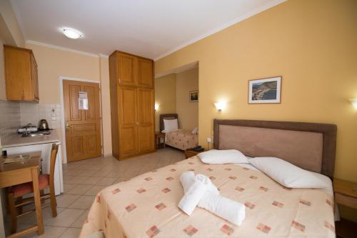 Кровать или кровати в номере Sofia Hotel