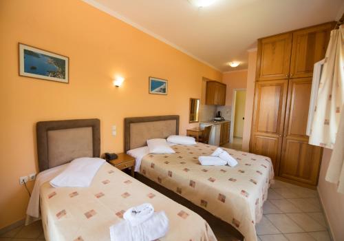 Кровать или кровати в номере Sofia Hotel