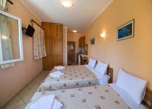 Кровать или кровати в номере Sofia Hotel