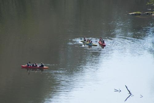 a group of people in canoes in the water at Camping Esponellà in Esponellá