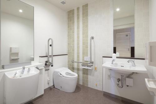 Bathroom sa New Matto Terminal Hotel