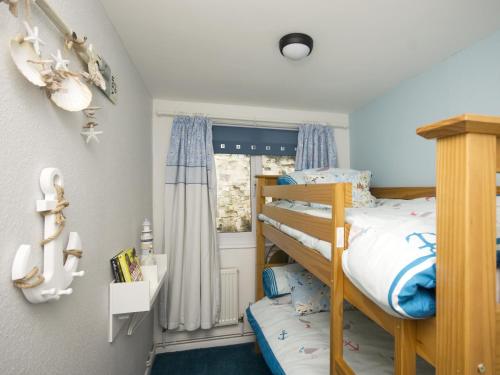 Sail Away Holiday Villa tesisinde bir ranza yatağı veya ranza yatakları