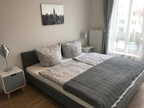 Кровать или кровати в номере Ferien Apartment