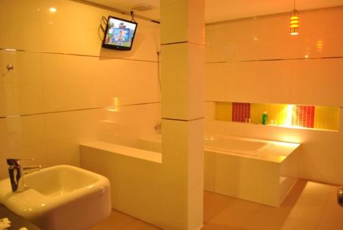 Koupelna v ubytování O.U.M. Hotel - โรงแรมโอยูเอ็ม