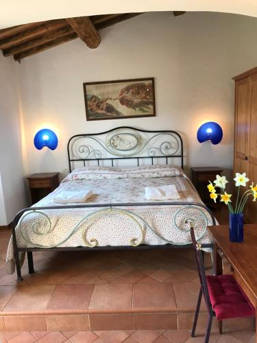 Кровать или кровати в номере B&B La Fonte del Machiavelli