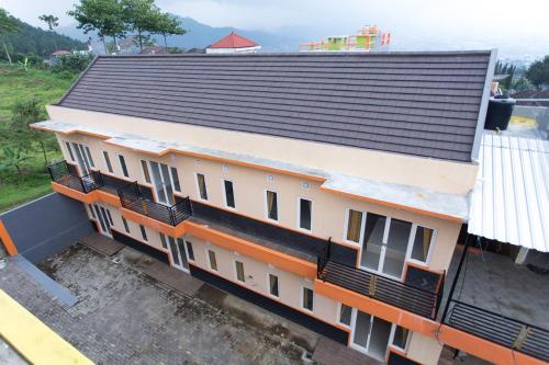 an overhead view of a building with a roof at Batuque Town Villa 2 in Batu