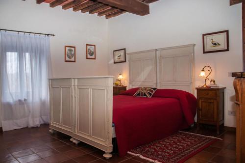 En eller flere senge i et værelse på Il Poggiolo di Parrano