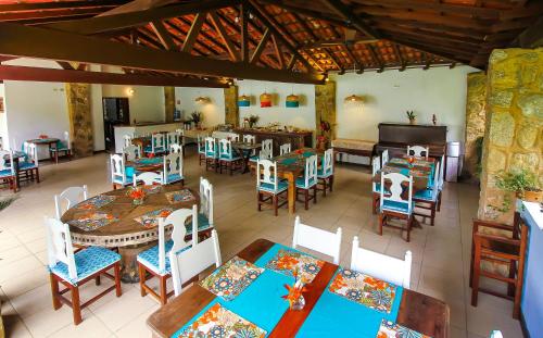 Restoran atau tempat lain untuk makan di Pousada Chácara Das Acácias
