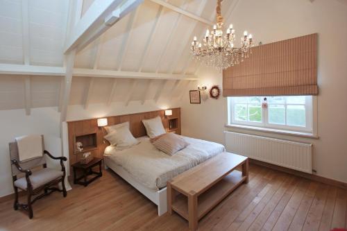 Postel nebo postele na pokoji v ubytování B&B Villa Sans Soucis