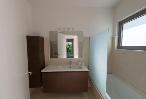 Koupelna v ubytování Villa Gonia