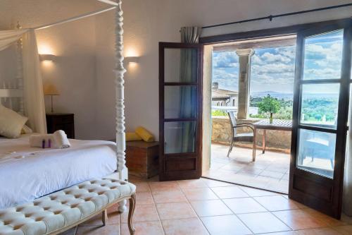 Ένα ή περισσότερα κρεβάτια σε δωμάτιο στο New Can Furios Hotel by Can Calco Hotels