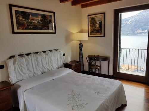 Ένα ή περισσότερα κρεβάτια σε δωμάτιο στο Casa Pina