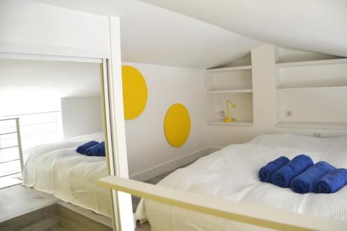 Ένα ή περισσότερα κρεβάτια σε δωμάτιο στο Maison d'Azur