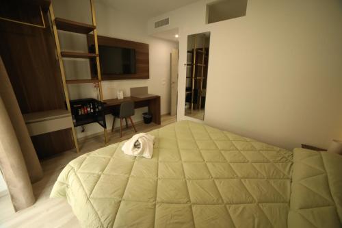 Letto o letti in una camera di 8room Hotel
