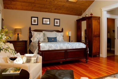 Säng eller sängar i ett rum på Coho Cottages
