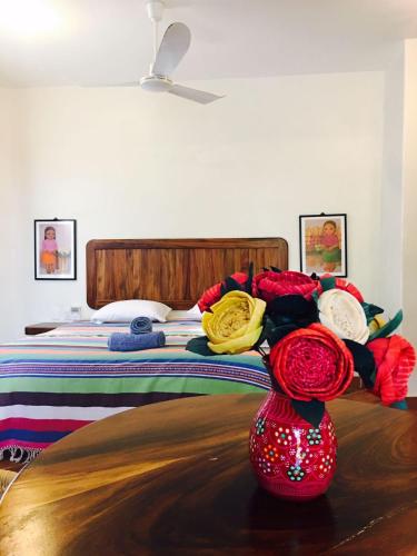 Cama o camas de una habitación en Cielito Lindo Suites