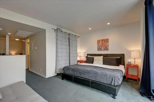 a bedroom with a large bed in a room at Littlefield Lofts #302 in Austin