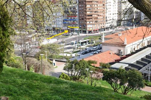 a view of a city with a street and buildings at Santander Central Hostel in Santander